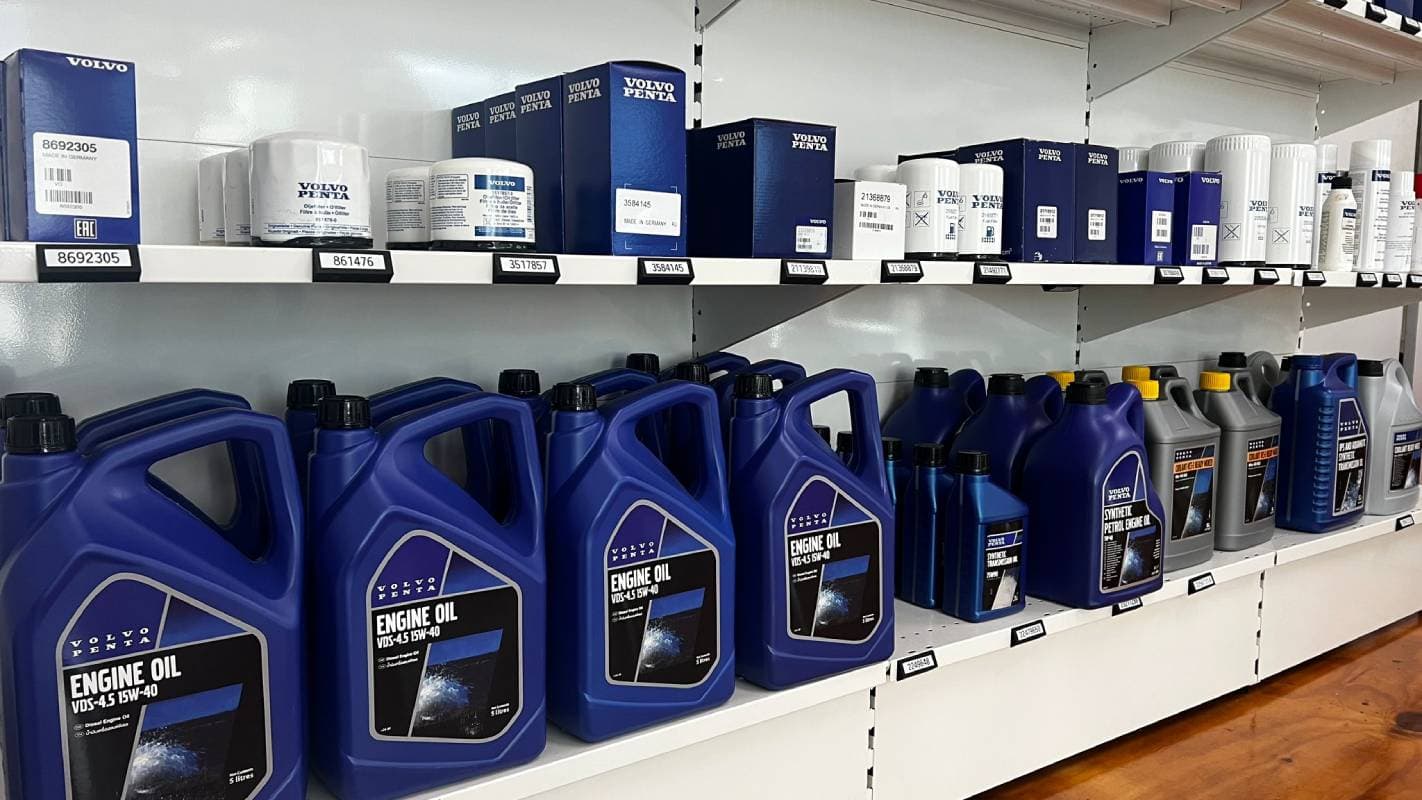 Genuine Volvo Penta filters and engine oil on the shelves